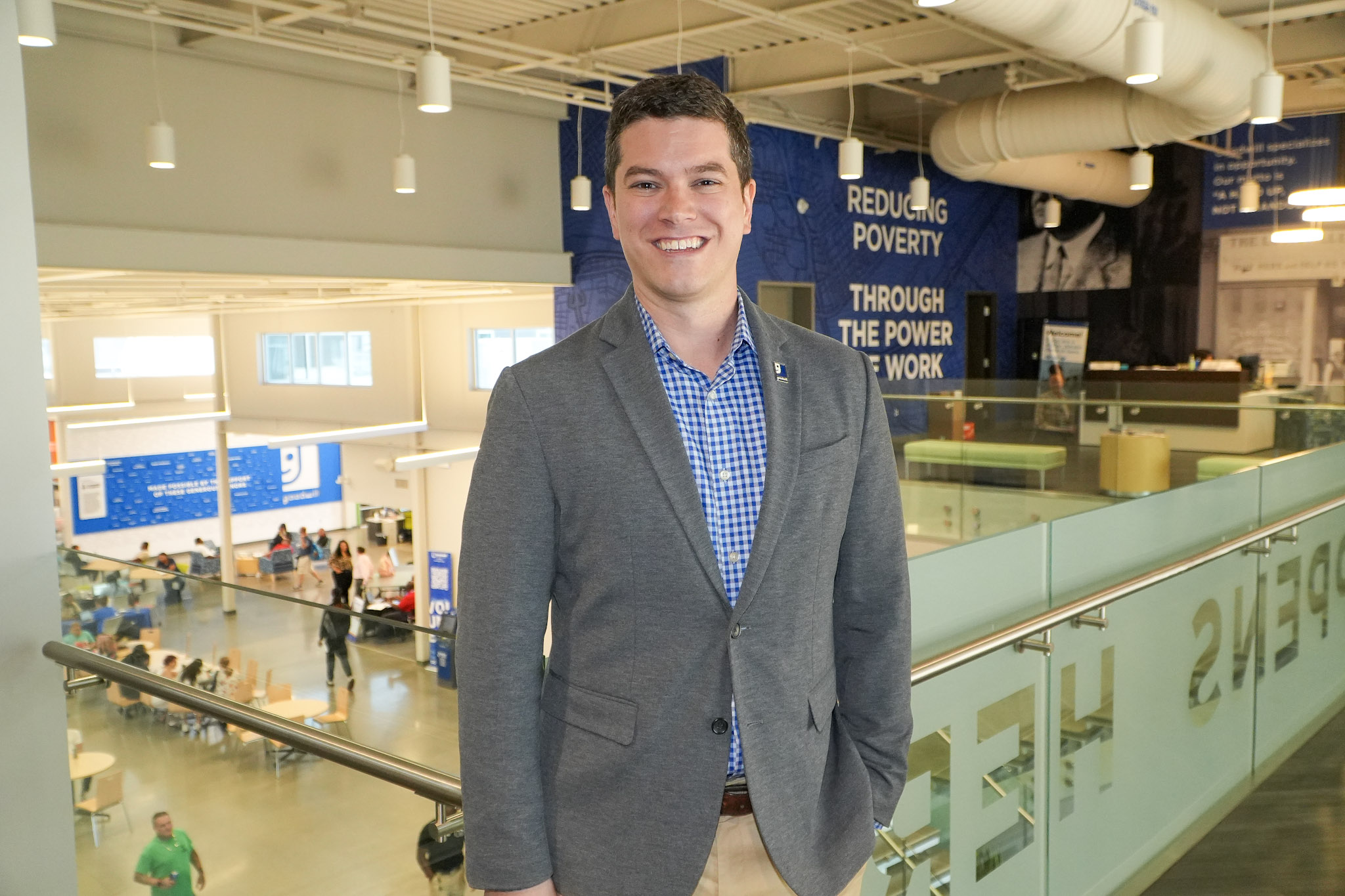 man stands in business environment