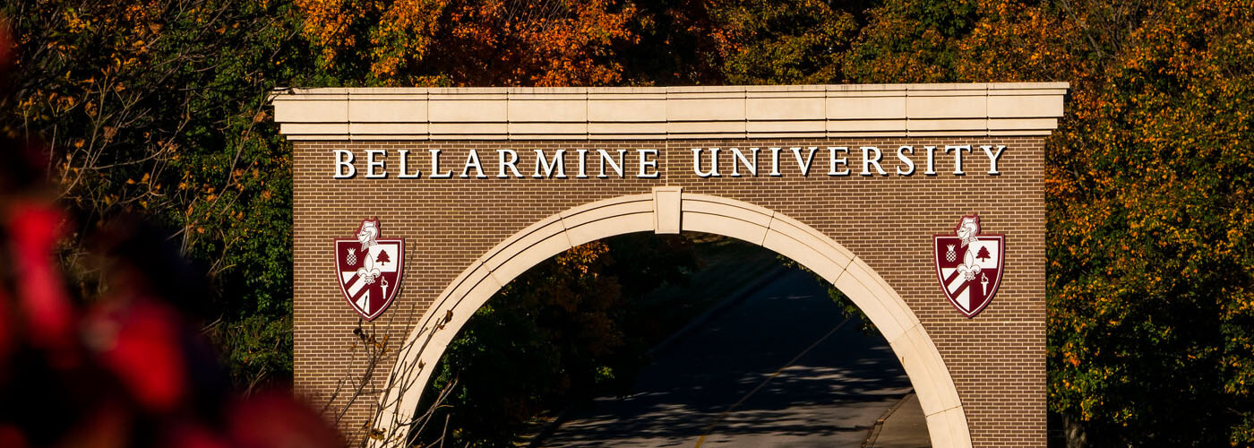 annual report header Bellarmine arch in fall