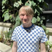 Bellarmine University English student Joshua Bloom poses for a portrait.