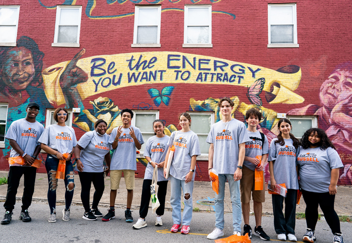 Students participate in community engagement while volunteering in the Louisville community