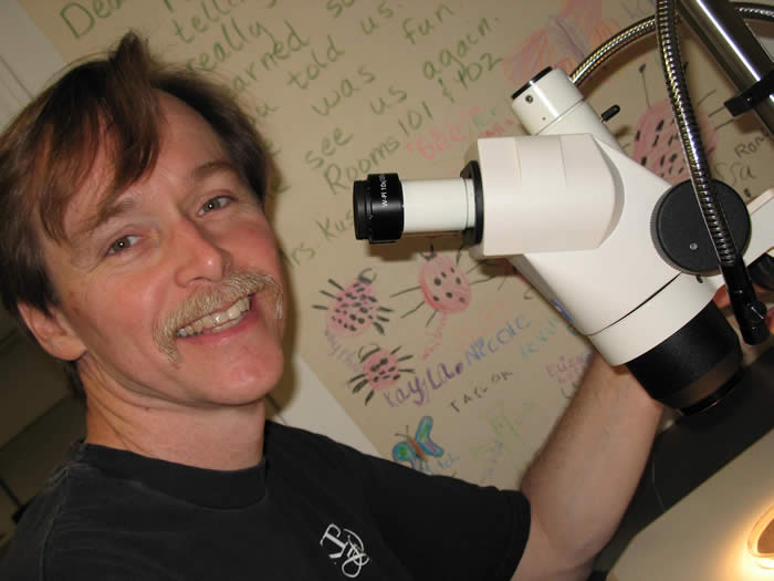 Anthony Lentz at microscope