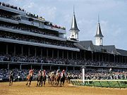 The Kentucky Derby in progress at Churchill Downs.