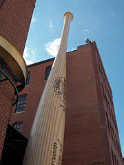A giant baseball bat adorns the outside of Louisville Slugger Museum in downtown Louisville.