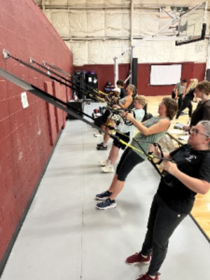 Patients perform exercises at the clinc.