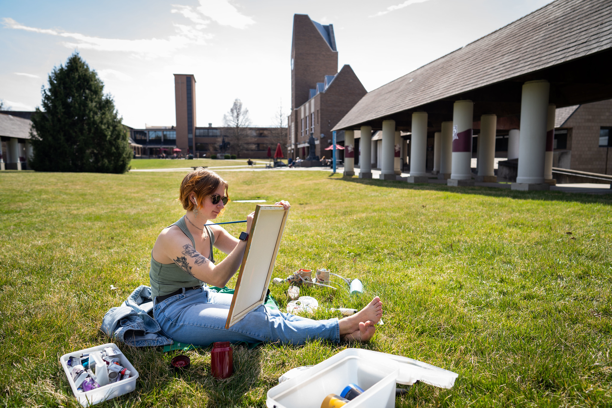 Art student painting in the Quad