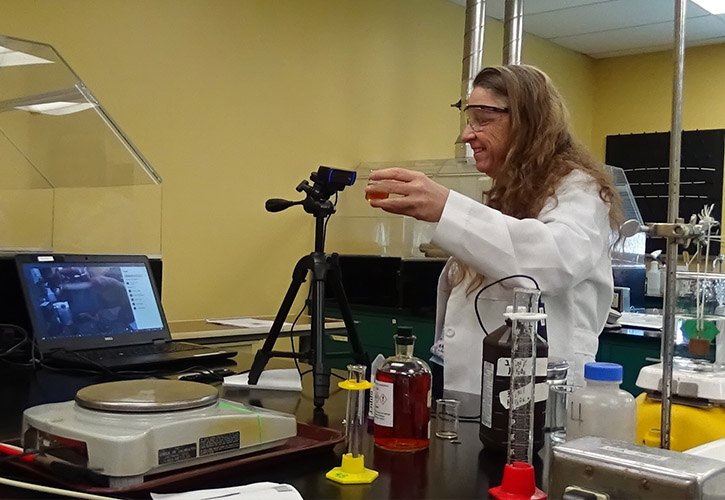 Professor Theresa Hahn performs a chemistry experiment for students via Microsoft Teams 