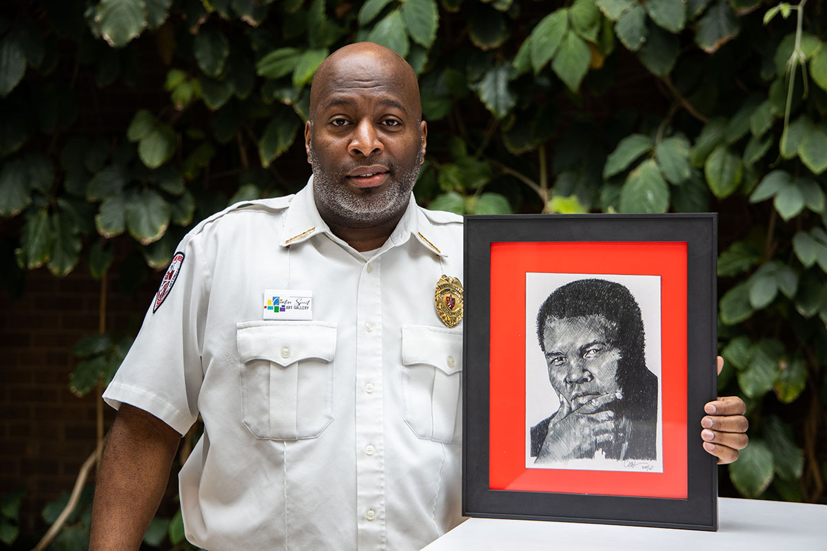 Darryl Woodson and his drawing of Muhammed Ali