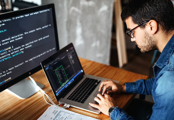 Image depicts a male who could be portrayed as either a computer science student or a professional working in one of the positions mentioned in the article.