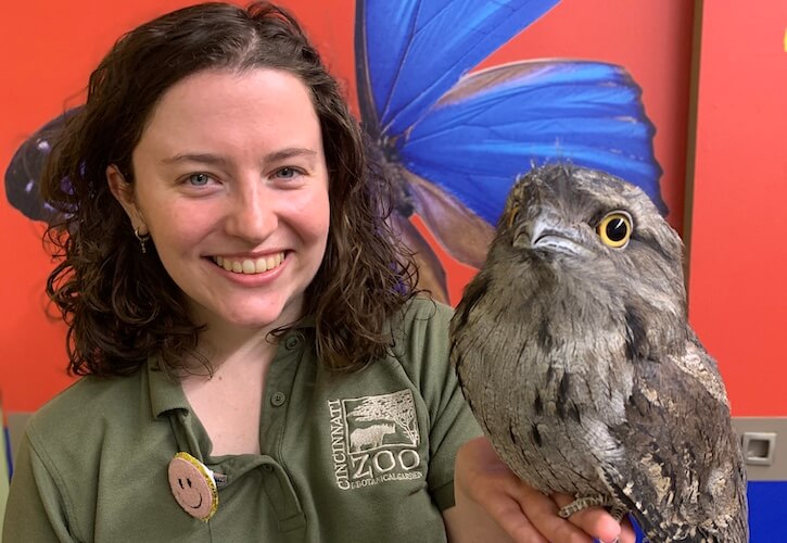 Eli Lonneman holds a feathered friend at the Cincinnati Zoo