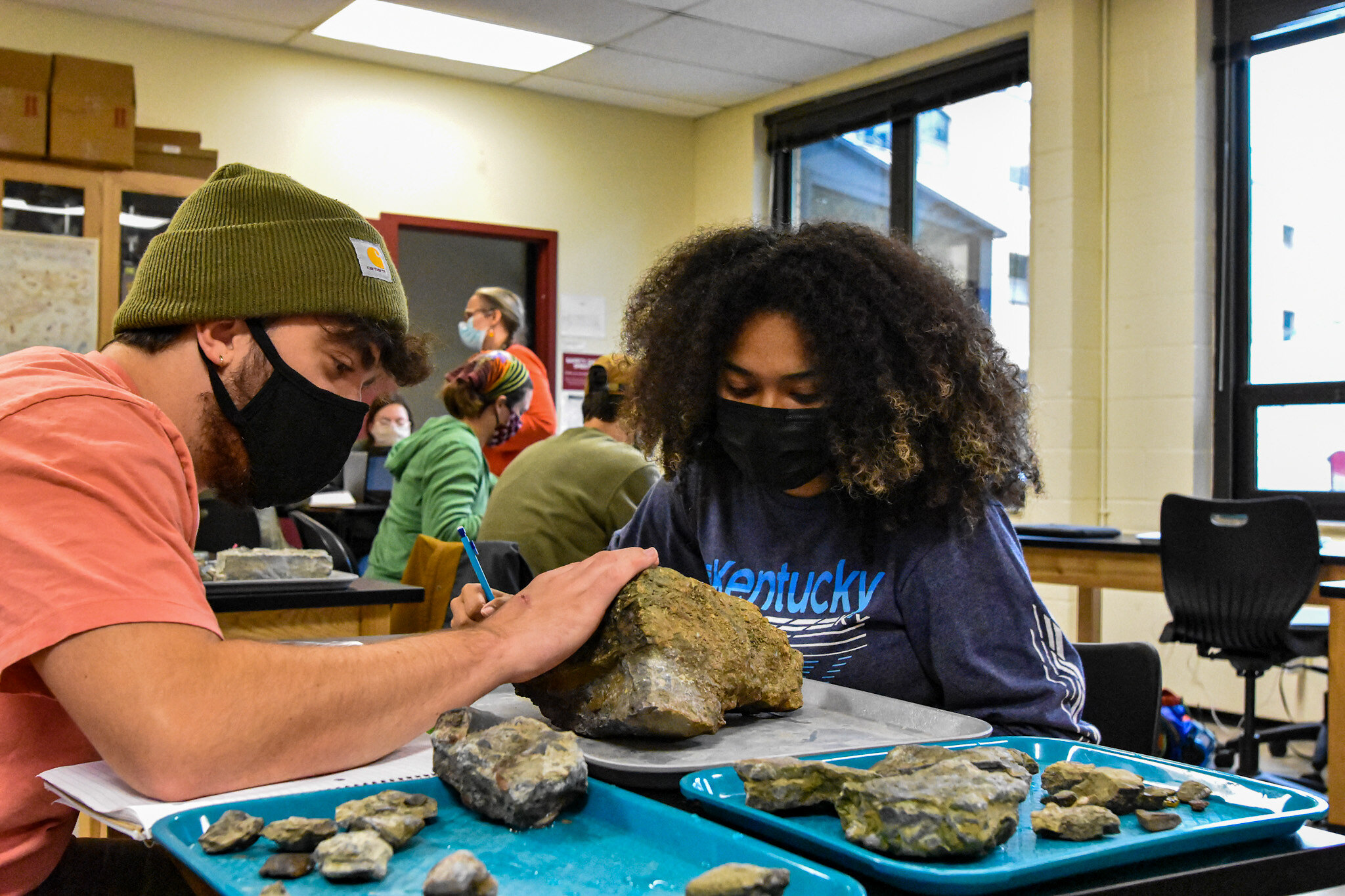 Students looking at rocks