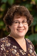 Bellarmine University English professor Dr. Kathryn West poses for a portrait.