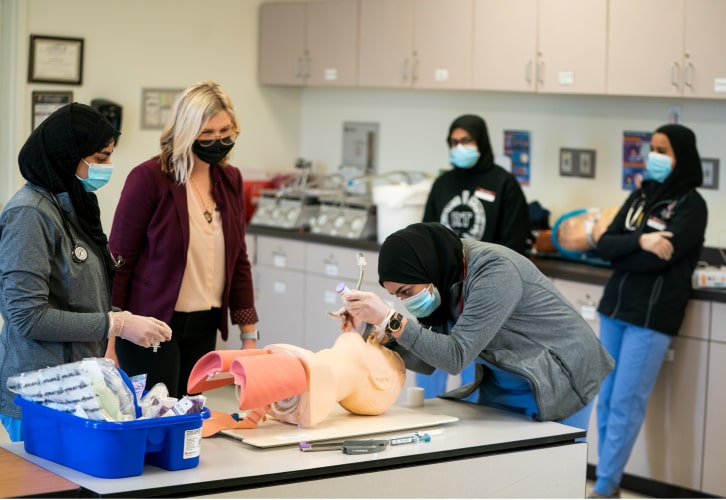 Respiratory therapy students practice intubation