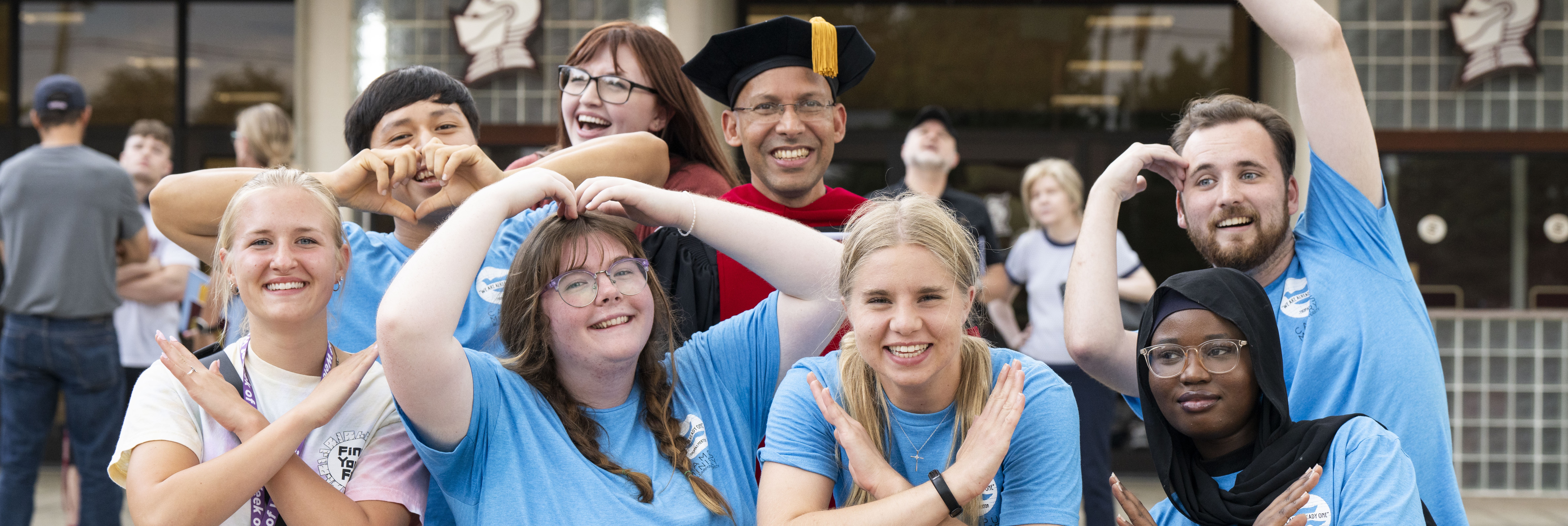 Father John along with sever Spiritual Peer Mentors at Convocation in 2024