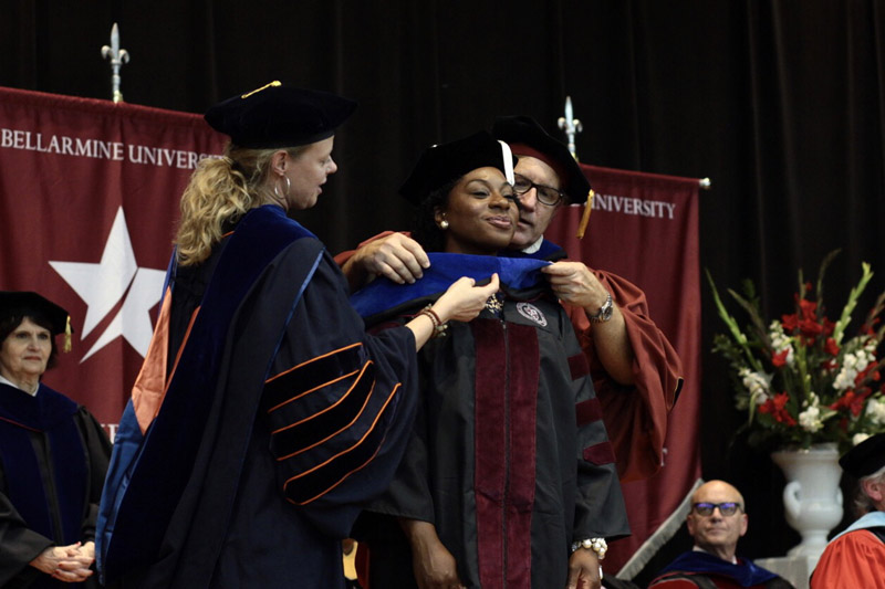 Doctoral student being hooded