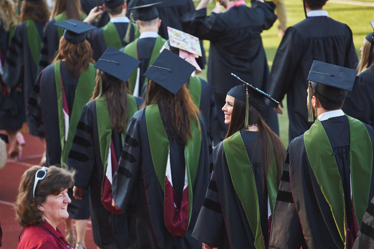 Students walking into Commencement 2018