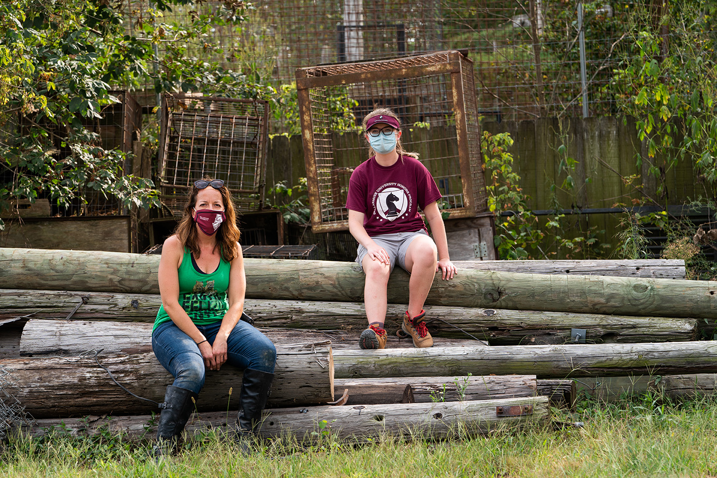 Dr. Carrie Doyle and her biology student Sylvia Ramsey at Indiana's Exotic Feline Rescue Center 