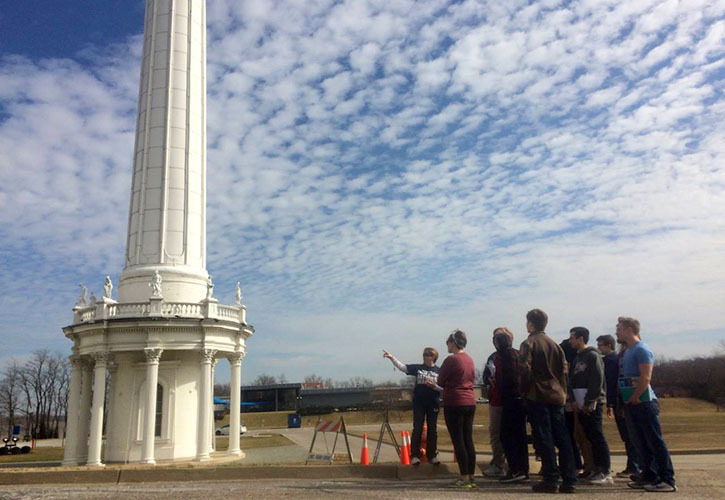 students gather around a tower at Louisville water company