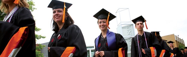 students walk through the quad during the commencement festivities