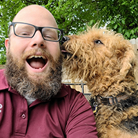 Jacob Smith posing with his dog