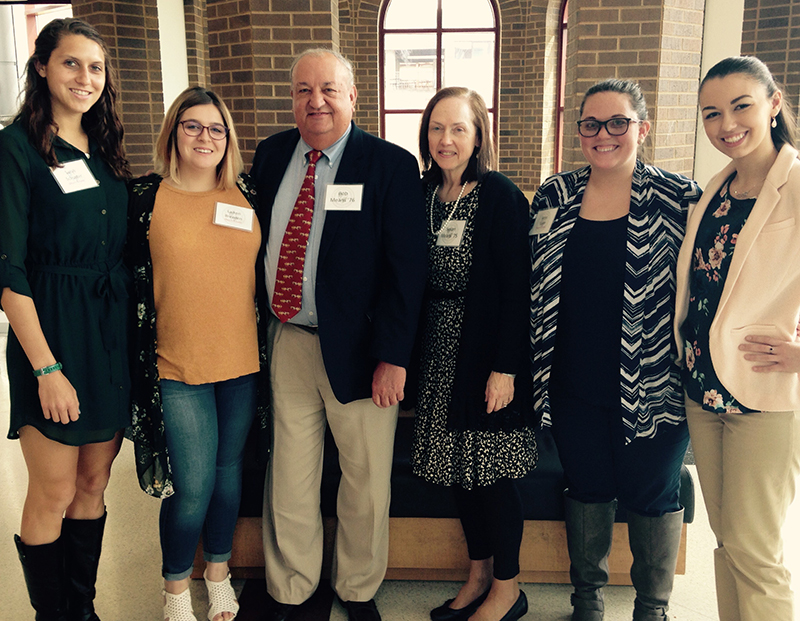 The Means Family with scholarship recipients The Means Family with scholarship recipients