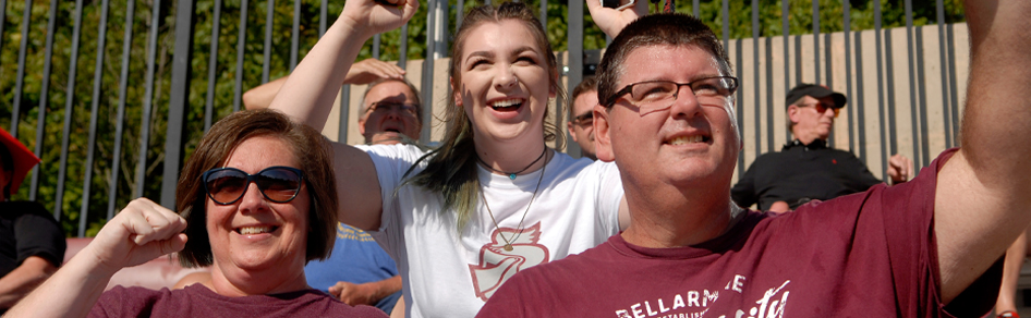 Family cheering on the Knights