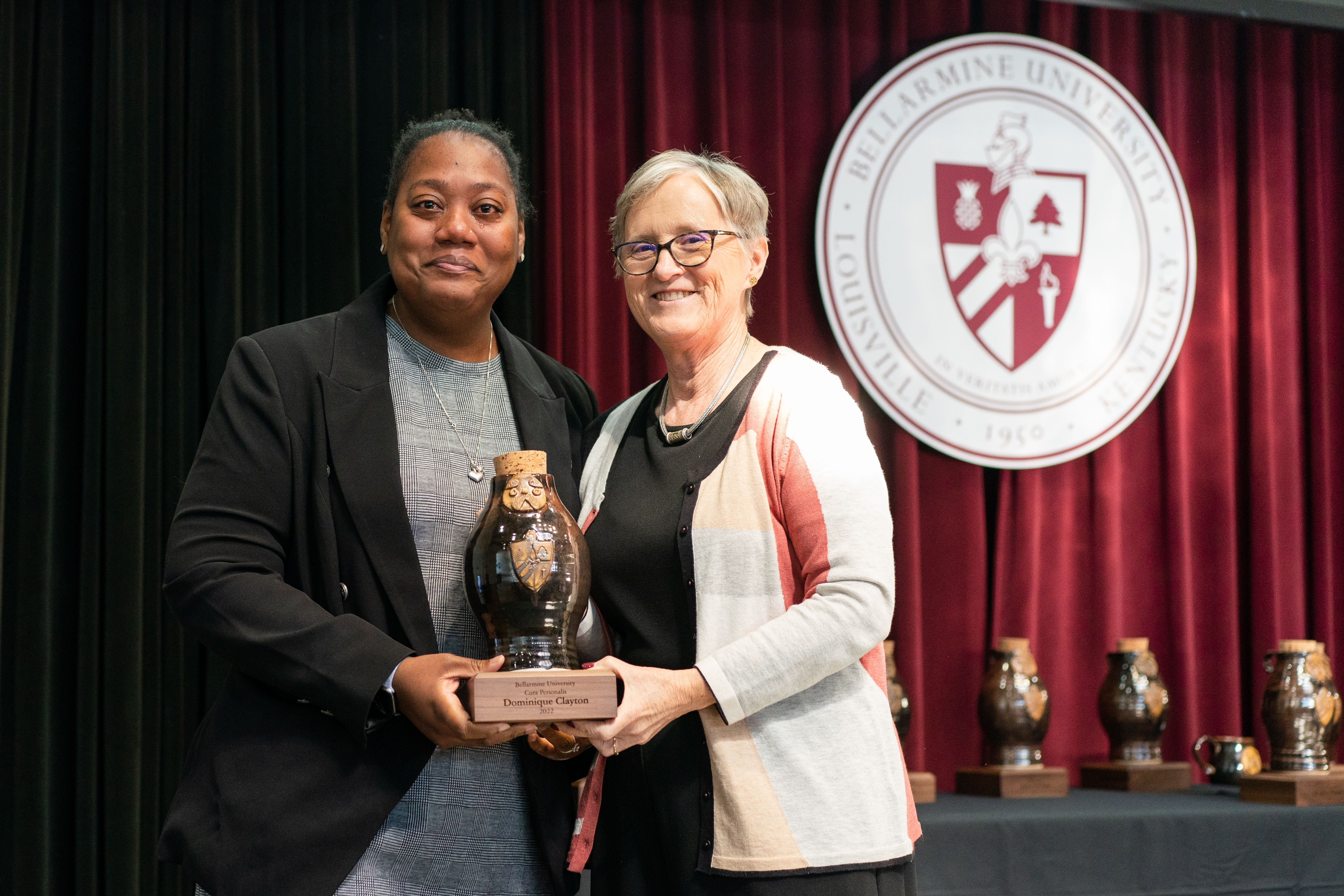 Dr. Dominique Clayton receives Cura Personalis award. 