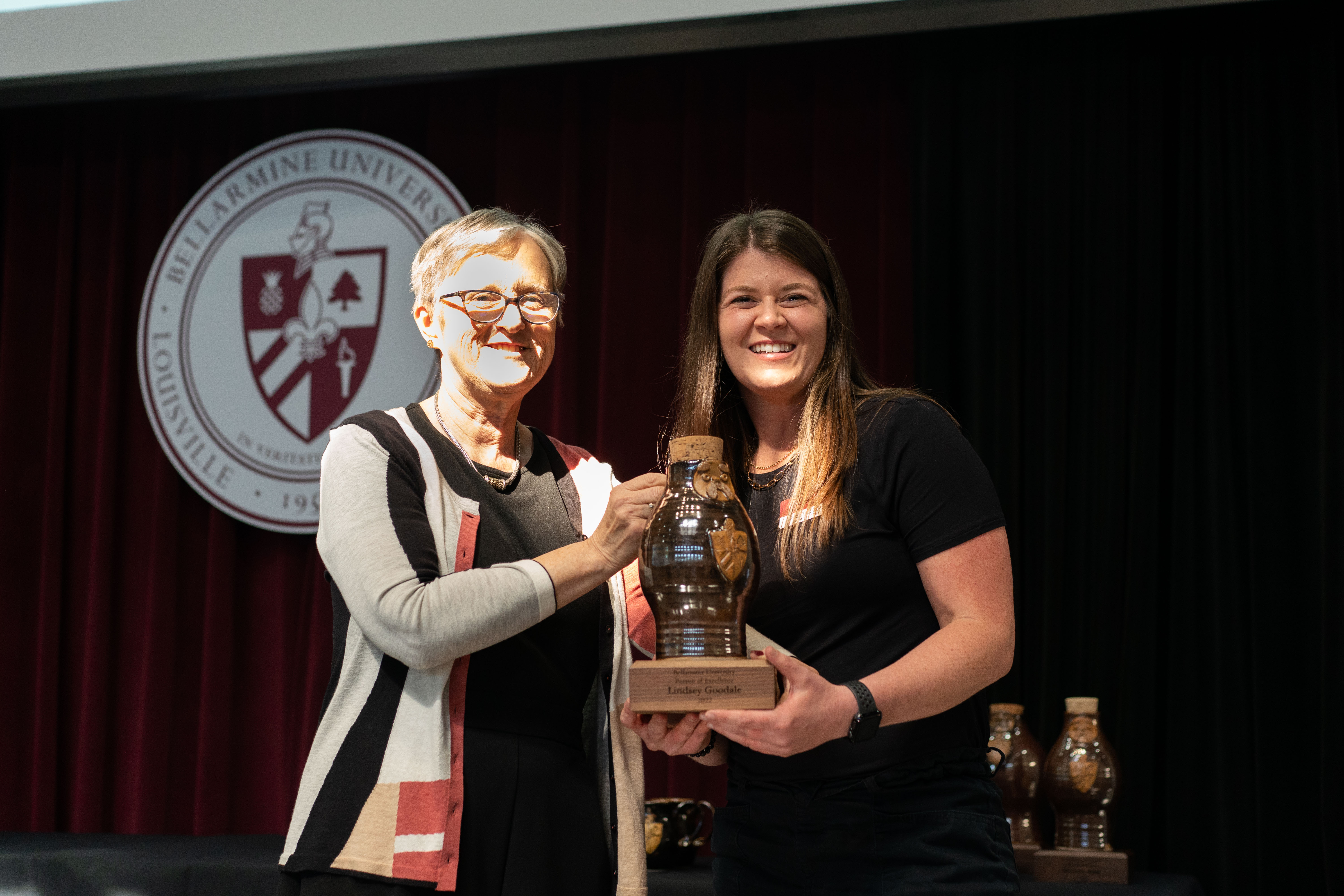 Lindsey Goodale receives award for Pursuit of Excellence.