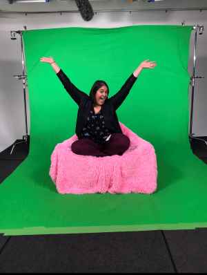 Emily Carroll '08 in front of Green Screen