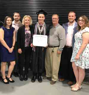 Chris Smith, ’19, ’22 and his family.