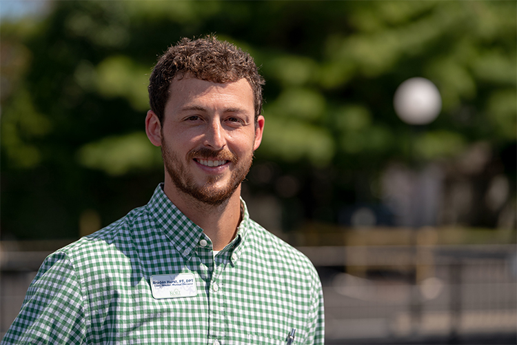 DPT student Braden poses outdoors