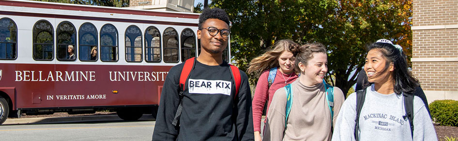 Students in front of arch