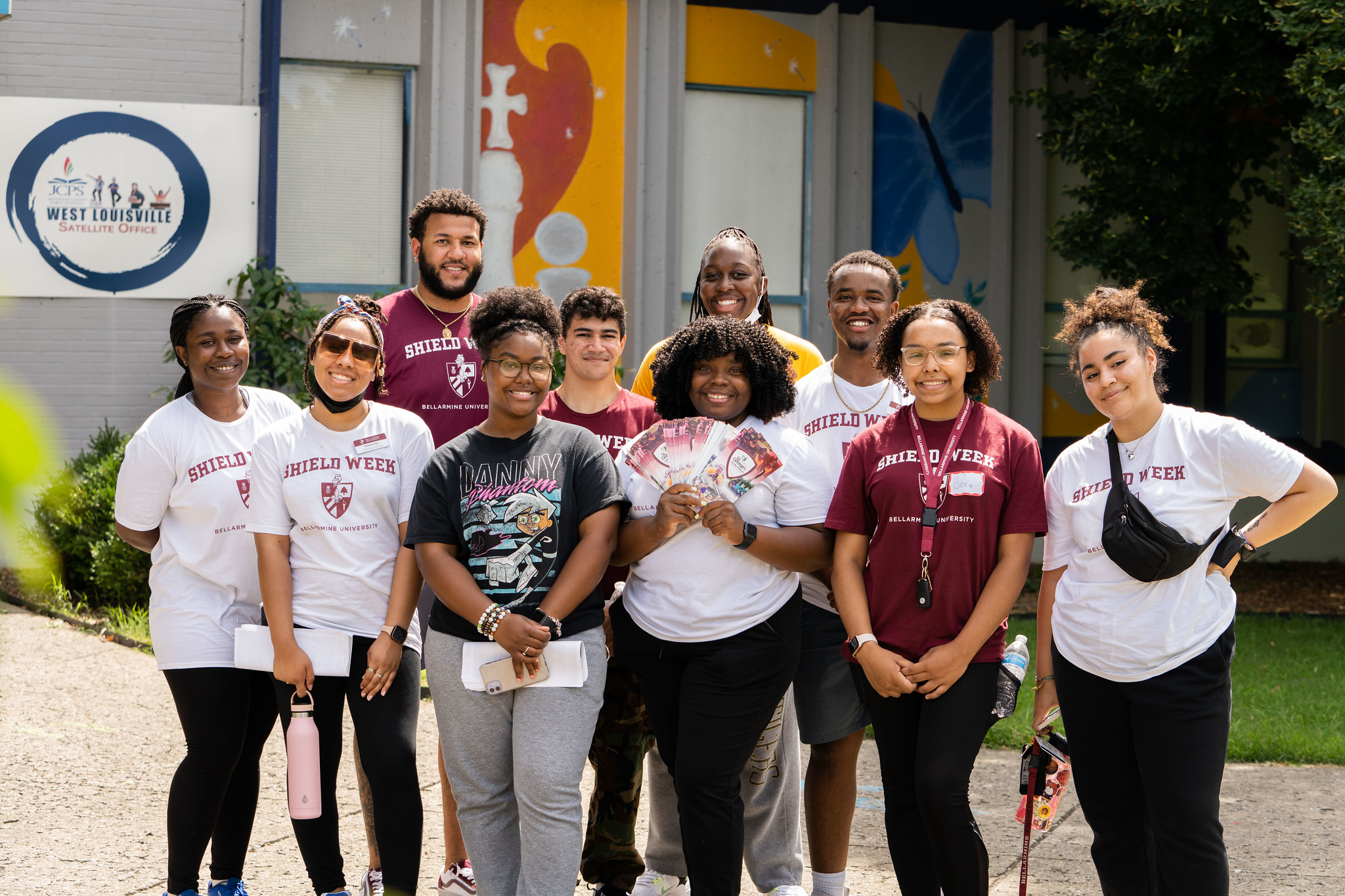 Students participate in community engagement while volunteering in the Louisville community