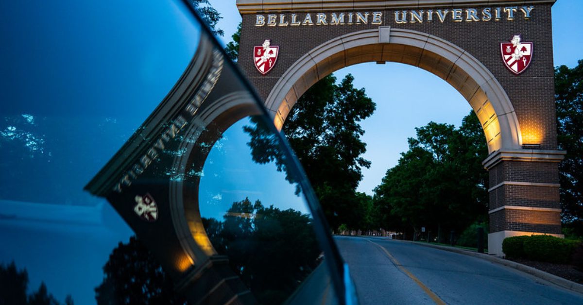 Bellarmine Arch reflected in car window