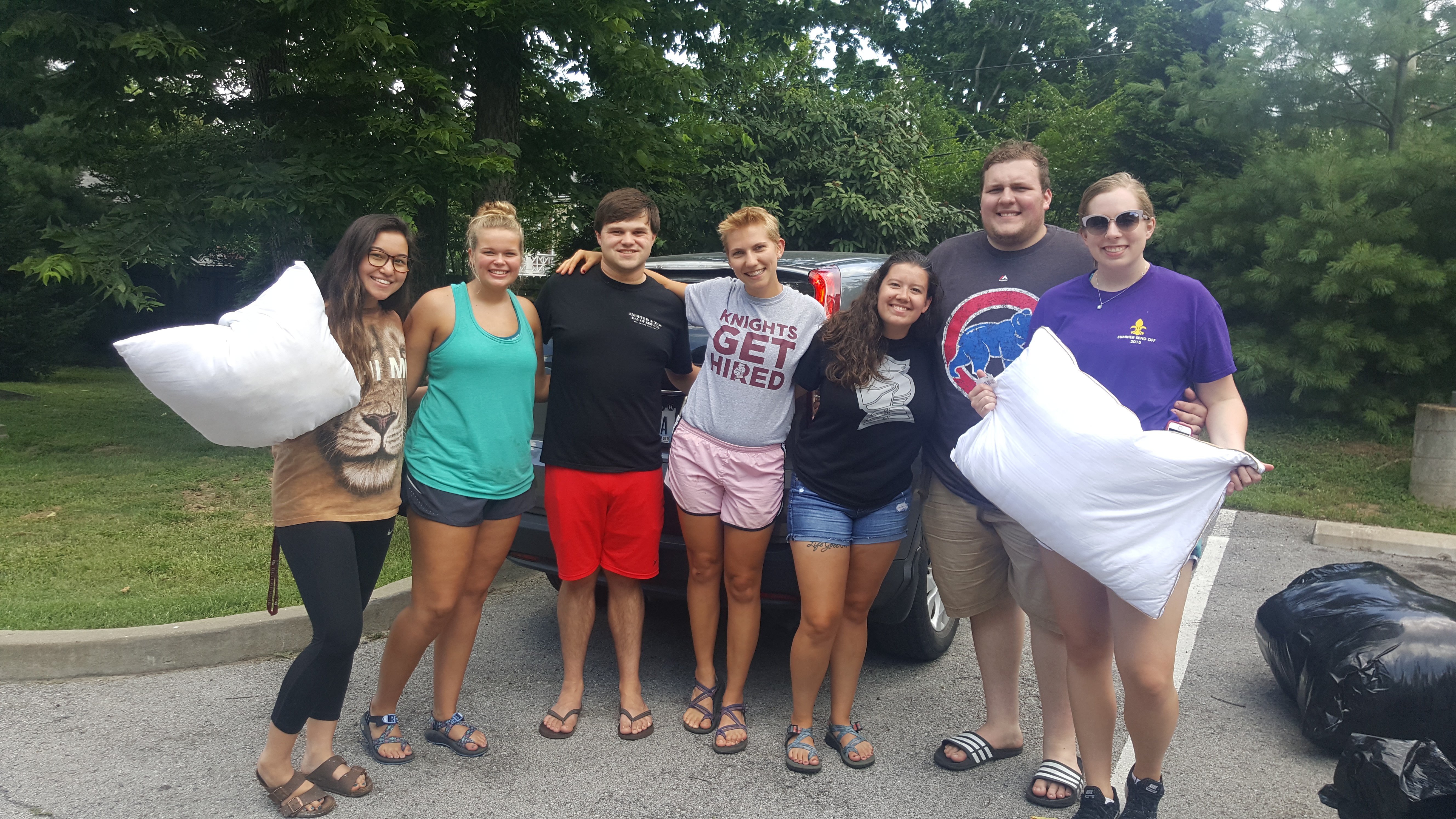 Students gathered holding pillows