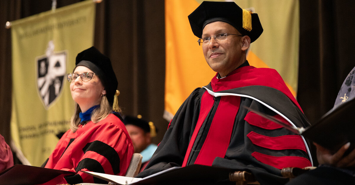 Dr. Kate Bulinski and Fr. John Pozhathuparambil at Bellarmine's Academic Convocation Ceremony on August 19, 2023