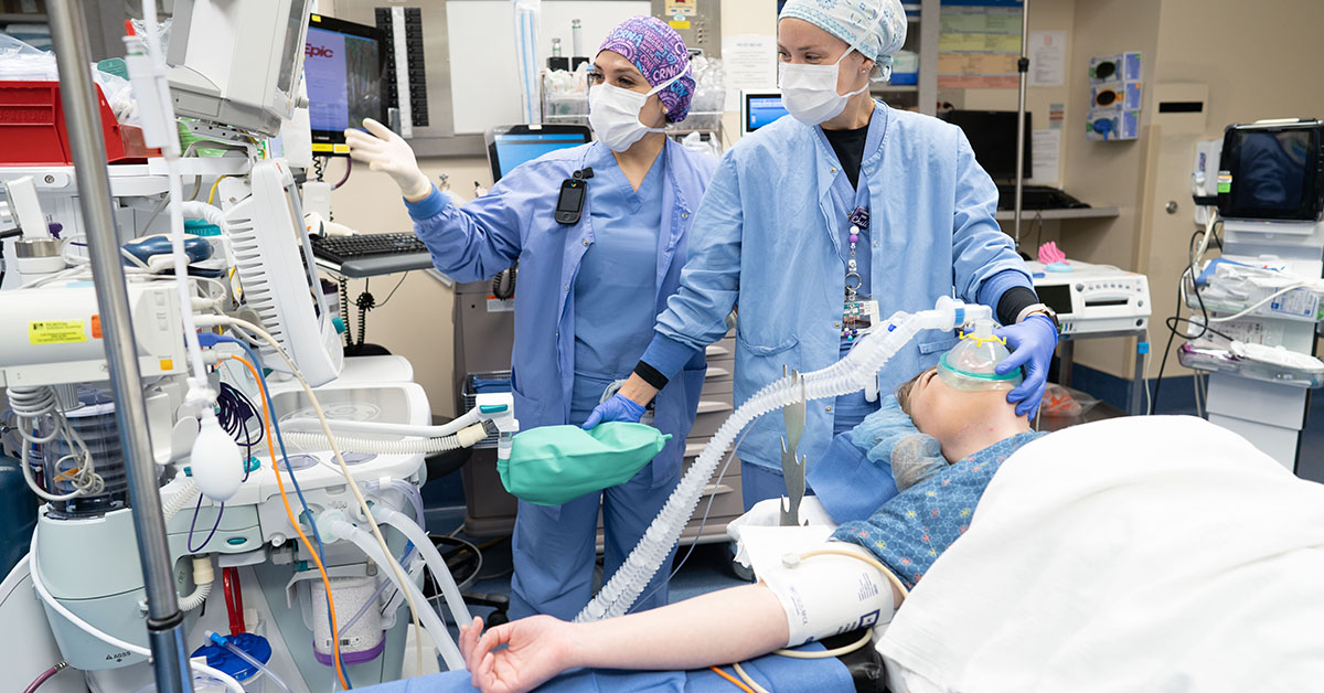 Dr. Carly Mitchell, the program administrator for the Doctor of Nursing Practice-Nurse Anesthesia Program at Bellarmine University, works alongside Tara Gardner, CRNA, at Norton Women's and Children's Hospital in Louisville.