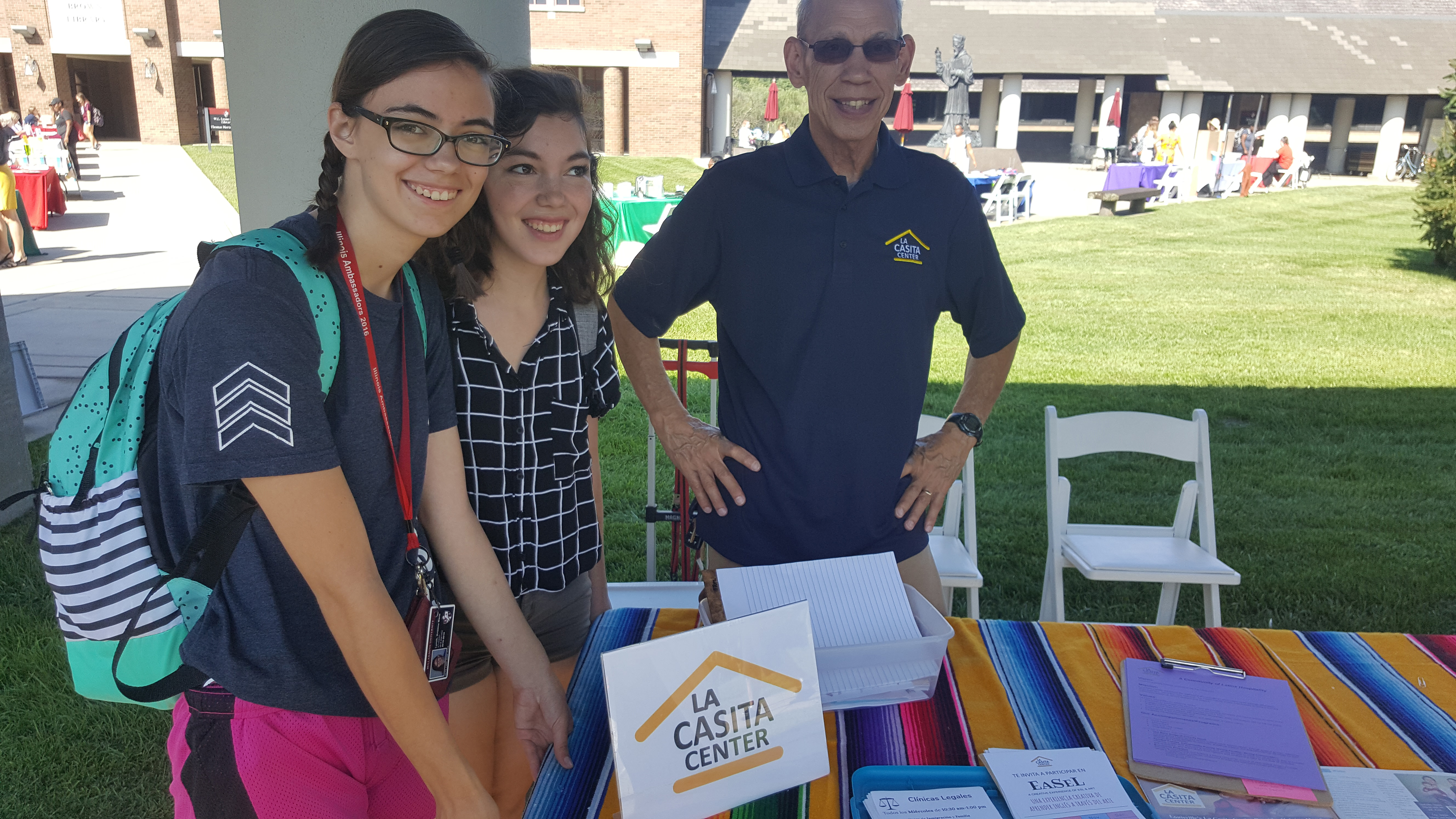 students at the la casita booth