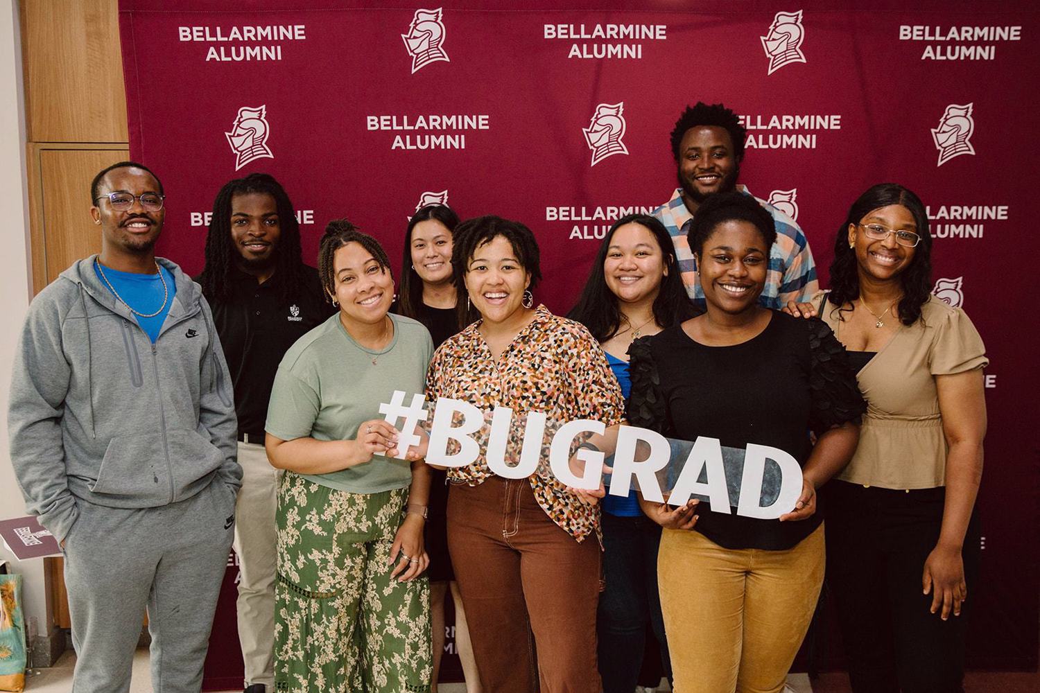 Seniors holding #BUGrad sign